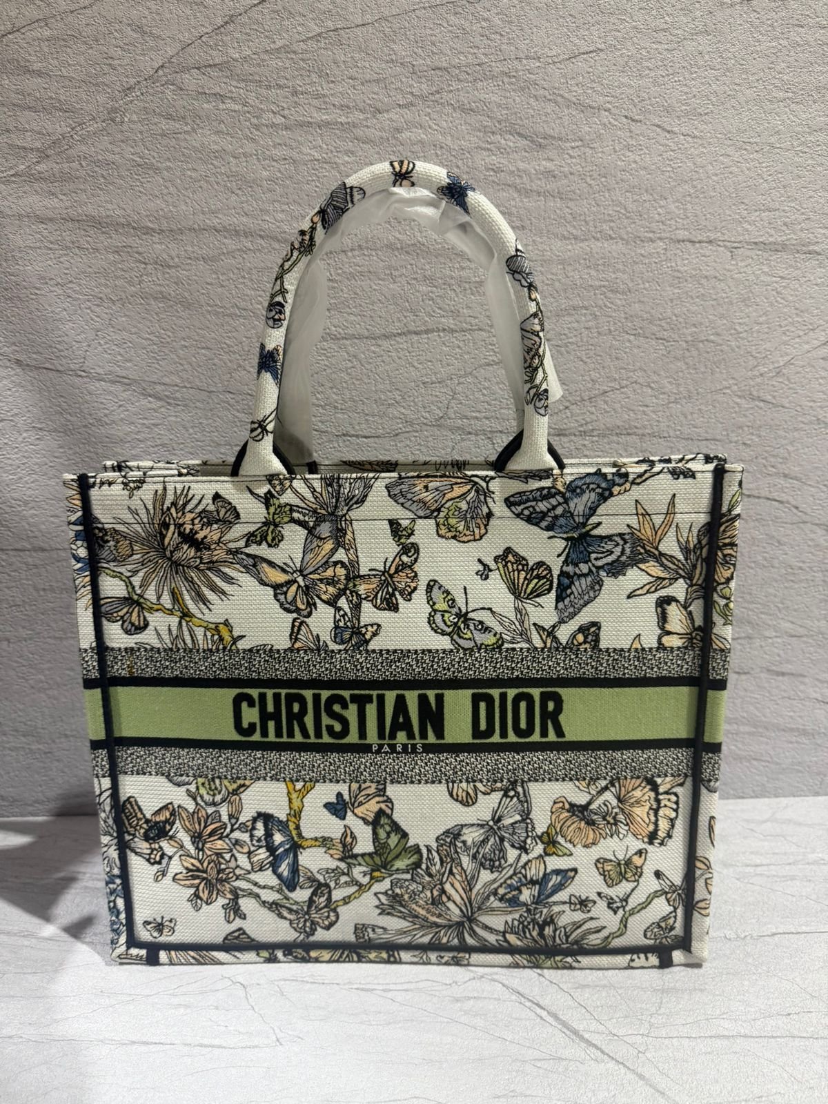 Christian Dior Book Tote, Lucky Star embroidered canvas design.