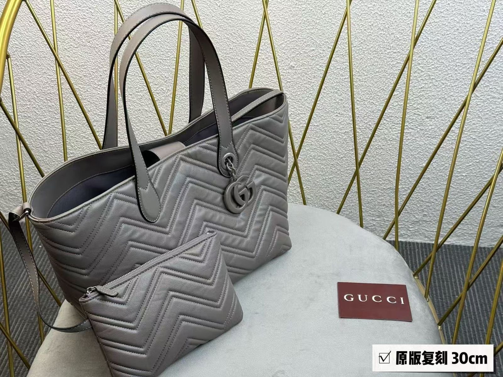 Gucci GG Marmont chevron matelassé leather tote bag.
